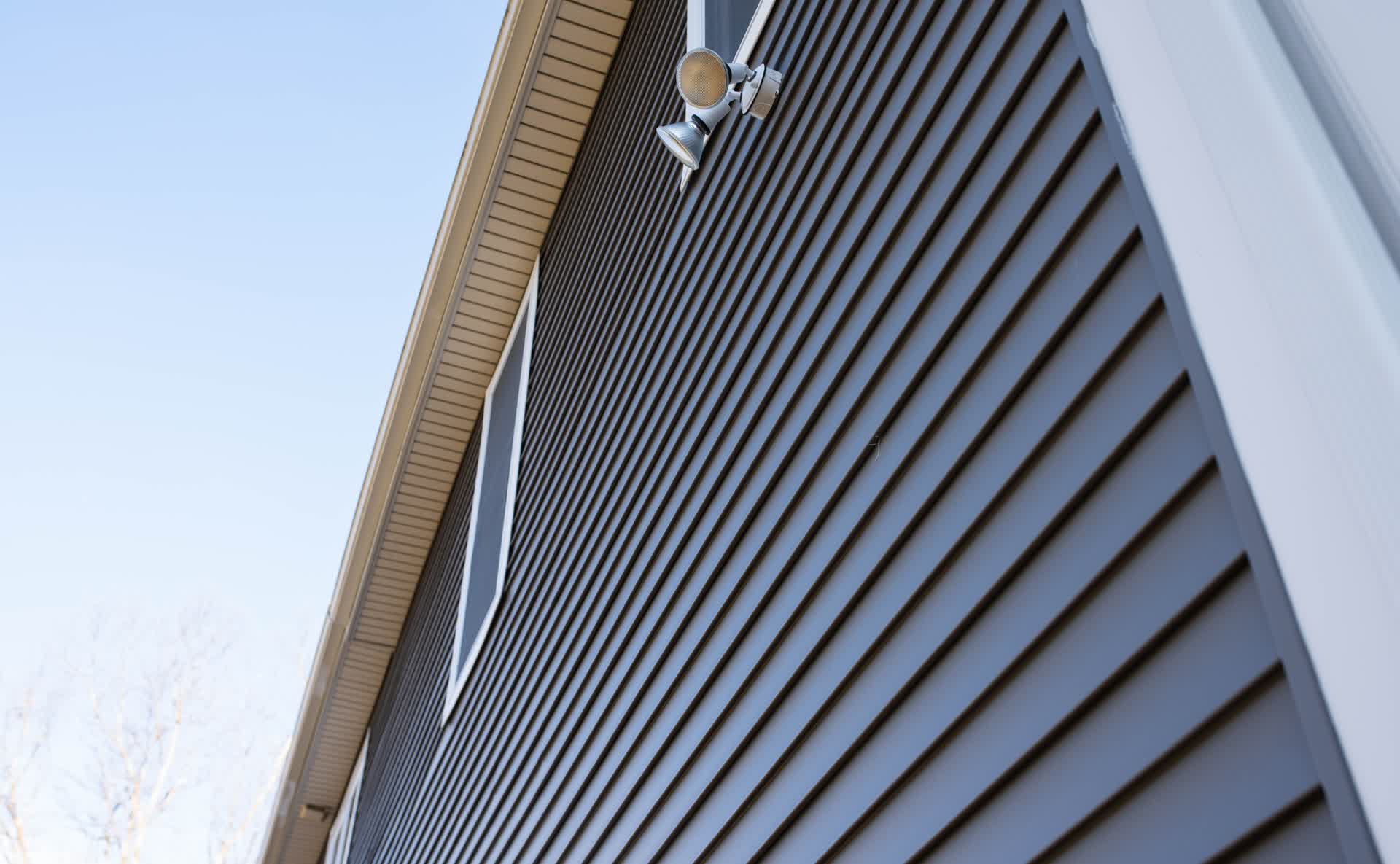 Vinyl siding installed on residential home exterior