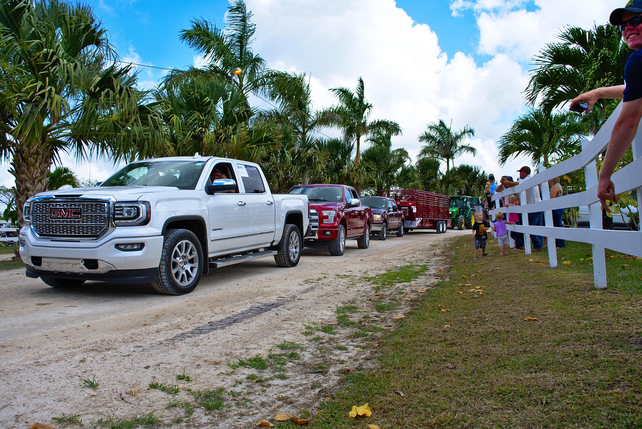 Work trucks lined up for roofing jobs