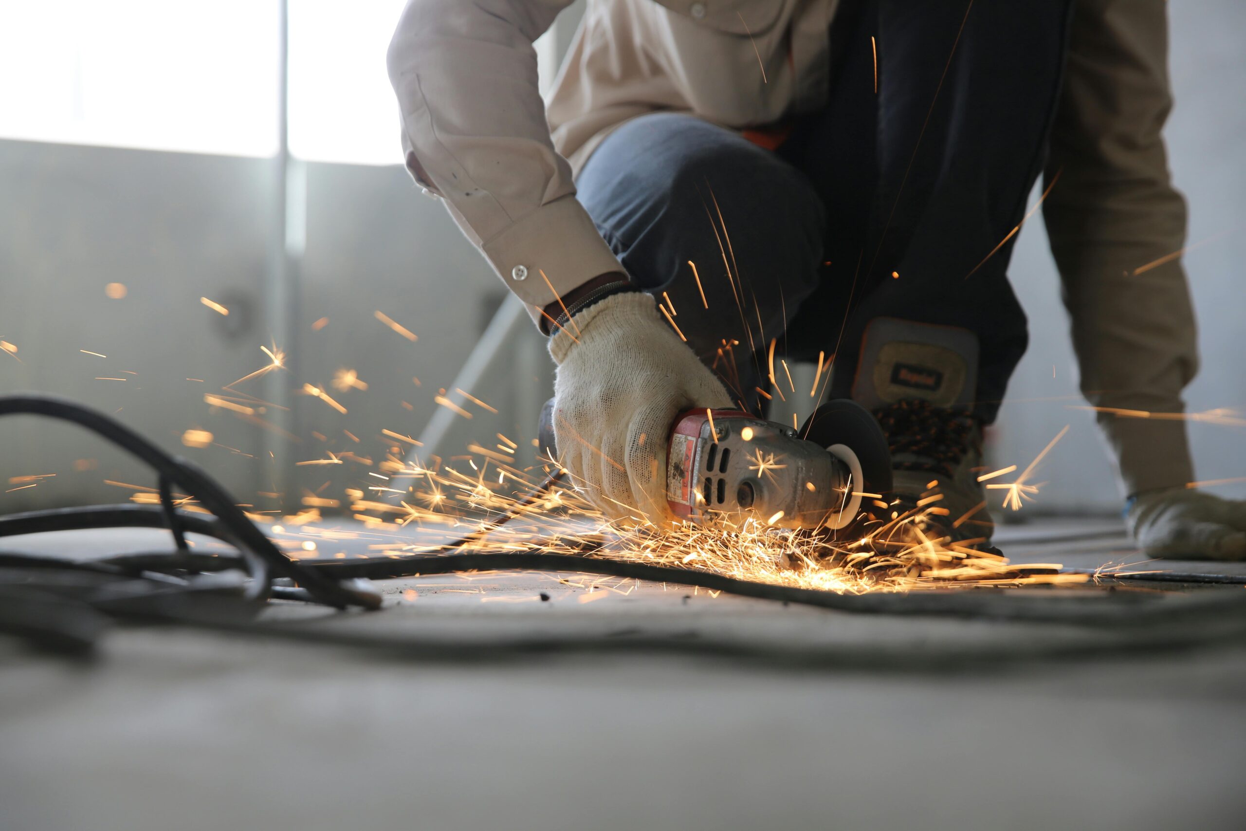 Contractor cutting materials during home improvement project